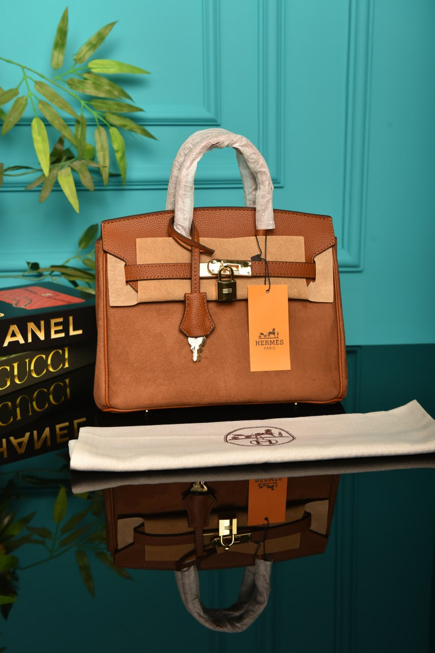 - The Birkin 25’ Suede